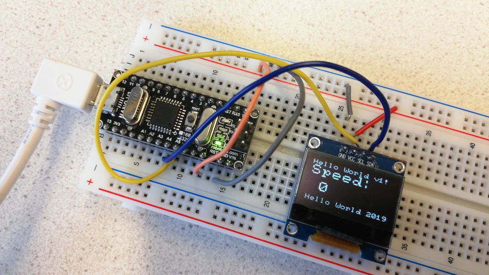 Photo of OLED display connected  to the Arduino.